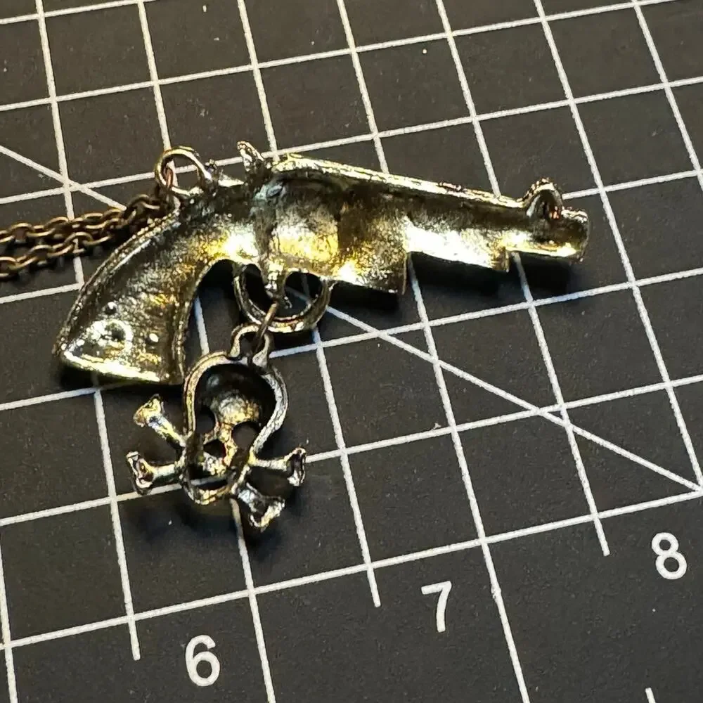 Antique gold tone rhinestone embellished pistol pendant necklace wester cowgirl